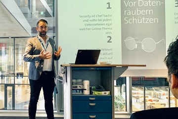 Raphael Boullet, IT-Sicherheit Experte KMU, Swisscom (Schweiz) AG, erläuterte den Gästen, wie moderner IT-Sicherheitsgrundschutz aussieht. Vergrösserte Ansicht